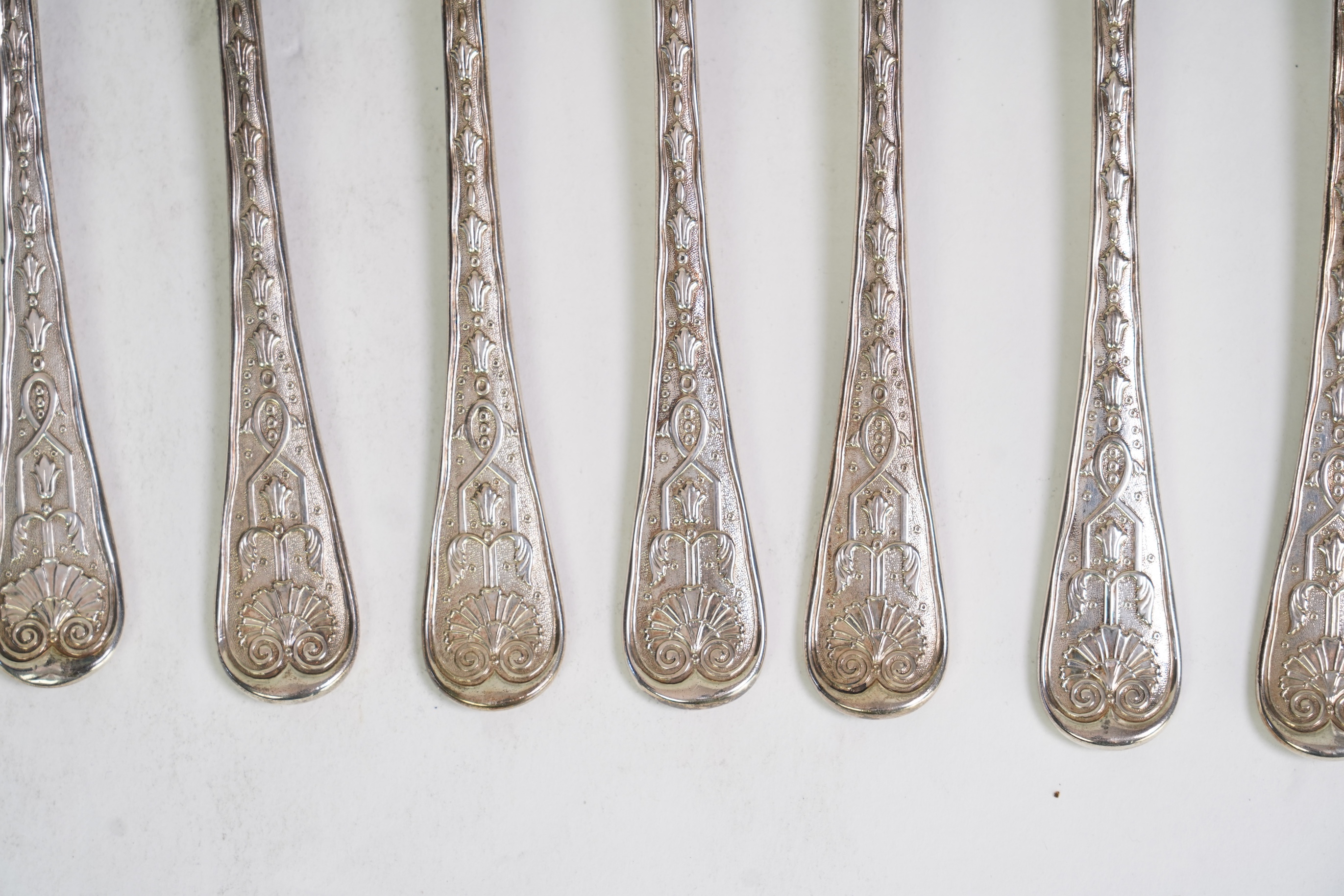 A harlequin set of twenty one Victorian and later silver fancy pattern table forks
